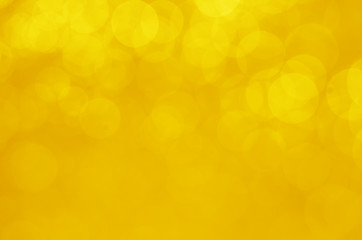 abstract yellow bokeh glitter sparkle background.