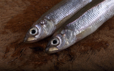 Obraz premium Smelt fish on cutting board