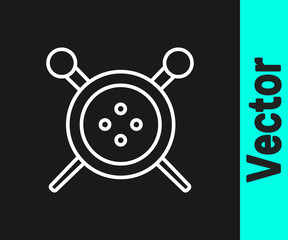 White line Sewing button and knitting needles icon isolated on black background. Clothing button. Vector Illustration