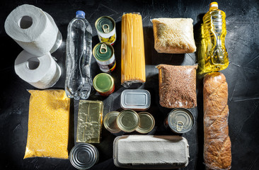 Food donations of different products on dark background