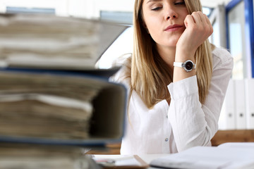 Lot of work wait for tired and exhausted woman. Huge pile of document folders, headache and depression, irs, new problems, emotion expression, vacancy or holiday dream concept