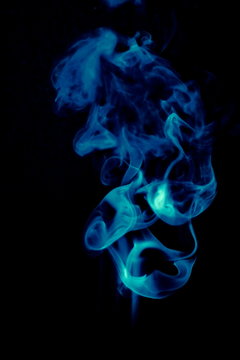 Close-up Of Smoke Against Black Background