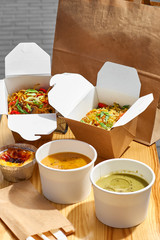 Healthy lunch menu, restaurant dish delivery. container with take away food, In eco boxes. copy space