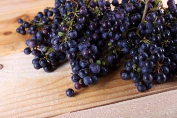 Black wine grape on table