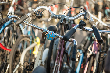 Naklejka premium Close-up detail view of old holland vintage classic bicycles. Cityscape view. Dutch lifestyle