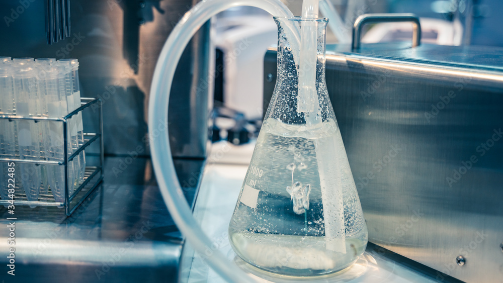 Poster testing flask in science laboratory