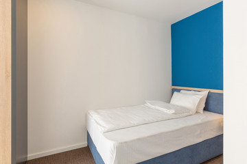 Fototapeta na wymiar Interior of a double bed hotel room interior