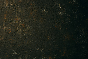 Old black color painted concrete with black scuffed rustic background and rust, horizontal...