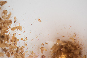 Soft background with grains of cereals fall in motion is macro