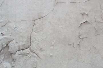 Cracks on the white walls, cracks of color