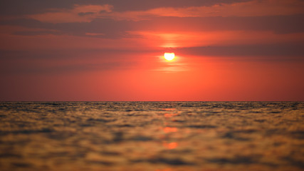 Fototapeta na wymiar landscape. sunset over the sea. red sun.