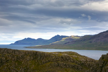 Fototapeta premium Holmanes peninsula & nature reserve is home to diverse & beautiful nature & landscape. Over 150 spicies of vegetation, as well as it being very rich in sea birds. Eskifjordur, East Iceland.