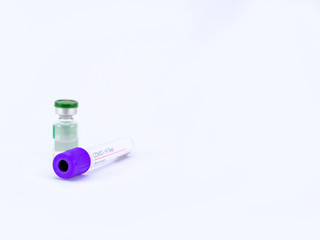 A blood sample tube for Coronavirus test with a vial on white background.