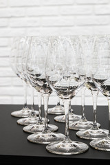 wine glasses are on the table in a bar or restaurant