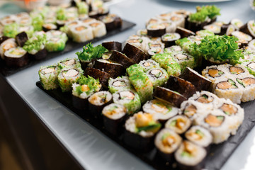 Different rolls background. Traditional sushi. Delicious japanese food.