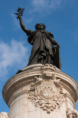 Obraz premium Statue of the French iconic figure, Marianne, in Paris' Place de la République