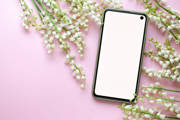 phone mockup with flower, blossom, flat lay, top view digital invitation with lily of the valley