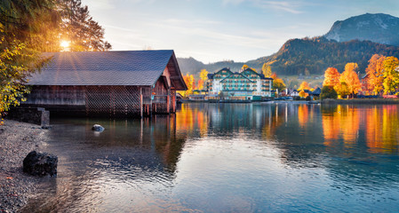 Fototapeta premium Panoramic autumn view of Altaussee village. Colorful evening scene of Altausseer lake. Captivating landscape of Austrian Alps. Traveling concept background.
