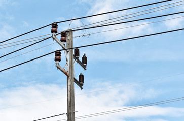 Electric pole with blue sky background