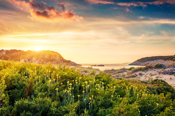 Amazing sunrise on Greece resort - Voidokilia beach. Fantastic summer seascape of Mediterranean...