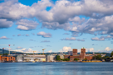 Oslo, Norway - Panoramic view of Oslo waterfront with City Hall, Aker Brygge and Tjuvholmen borough at Pipervika harbor