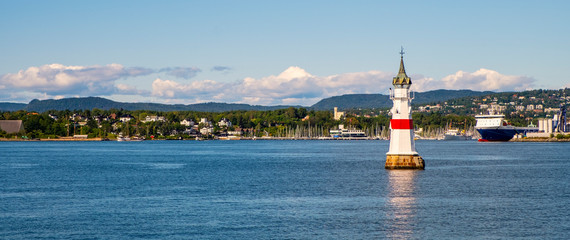 Oslo, Norway - Panoramic view of peripheral Oslo waterfront with Bygdoy peninsula and Lysaker borough at Oslofjord sea shore