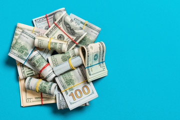 US Dollar bills bundles stack. one hundred dollar bills with stack of money in the middle. Top view...