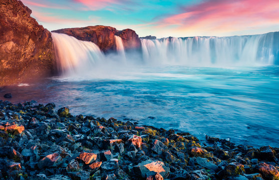Stunning morning view of Skjalfandafljot river, Iceland, Europe. Picturesque summer scene of Godafoss, waterfall plunging over a curved, 12m-high precipice, with paths to various viewpoints. © Andrew Mayovskyy