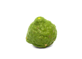 Green bergamot isolated with bruises on the skin
