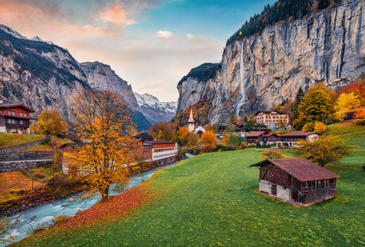 Impressive outdoor scene of Swiss Alps, Bernese Oberland in the canton of Bern, Switzerland, Europe. Magnificent autumn sunrise in Lauterbrunnen village. Beauty of countryside concept background.
