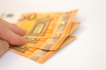 Fifty euro banknotes spread out isolated on white