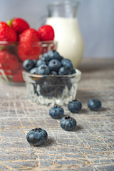 Blueberries and strawberries are prepared for breakfast. Healthy eating
