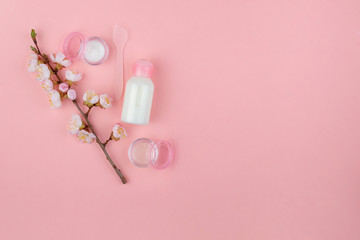 Set of natural cosmetics and Spa products on a pink background. Flat lay with space for text.