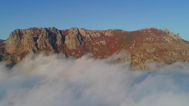 The canyon of Crimea is a popular place, fog, rocks in the clouds