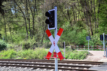 railroad crossing sign in countryside, Germany, Hessen