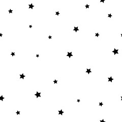 Naklejka premium Seamless abstract pattern with little sharp black stars on white background. Vector illustration.