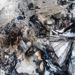 Burnt paper and ashes.