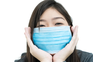 Woman long hair wearing protective mask and propping up chin with his hands