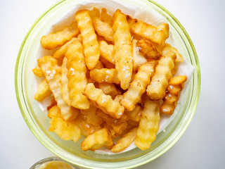 French fries golden brown, fried with oil and sprinkled with salt, sweet and salty