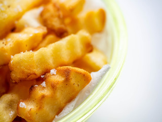 French fries golden brown, fried with oil and sprinkled with salt, sweet and salty