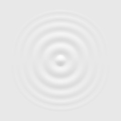 Splash ripple waves water surface. Drop falling on milk. Circles waves on the water. 