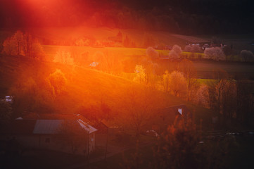 Orange sunrise in a rural landscape, Hrinova in Slovakia