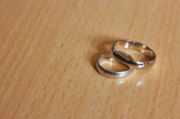 engagement ring on wooden background