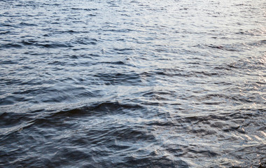 Water surface with ripples and waves.