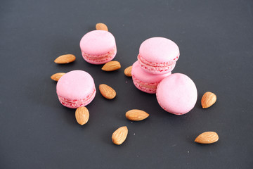 macaroons on a black background. Suitable for advertising background.