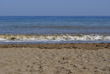 sea summer vacation beach water sky horizon rocks and sand resort vacation wet sand wild beach waves dark water