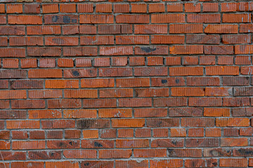 old abandoned red brick wall