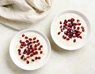 Oatmeal porridge with pomegranate seeds
