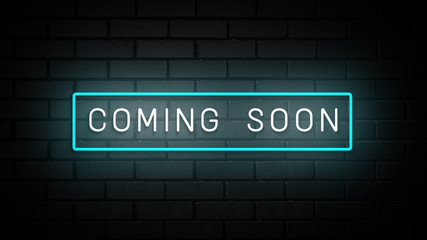 Coming Soon neon sign. white and blue glow. neon text. on brick wall background