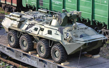 Russian BTR-80 armored personnel carrier on a railway platform, российский...
